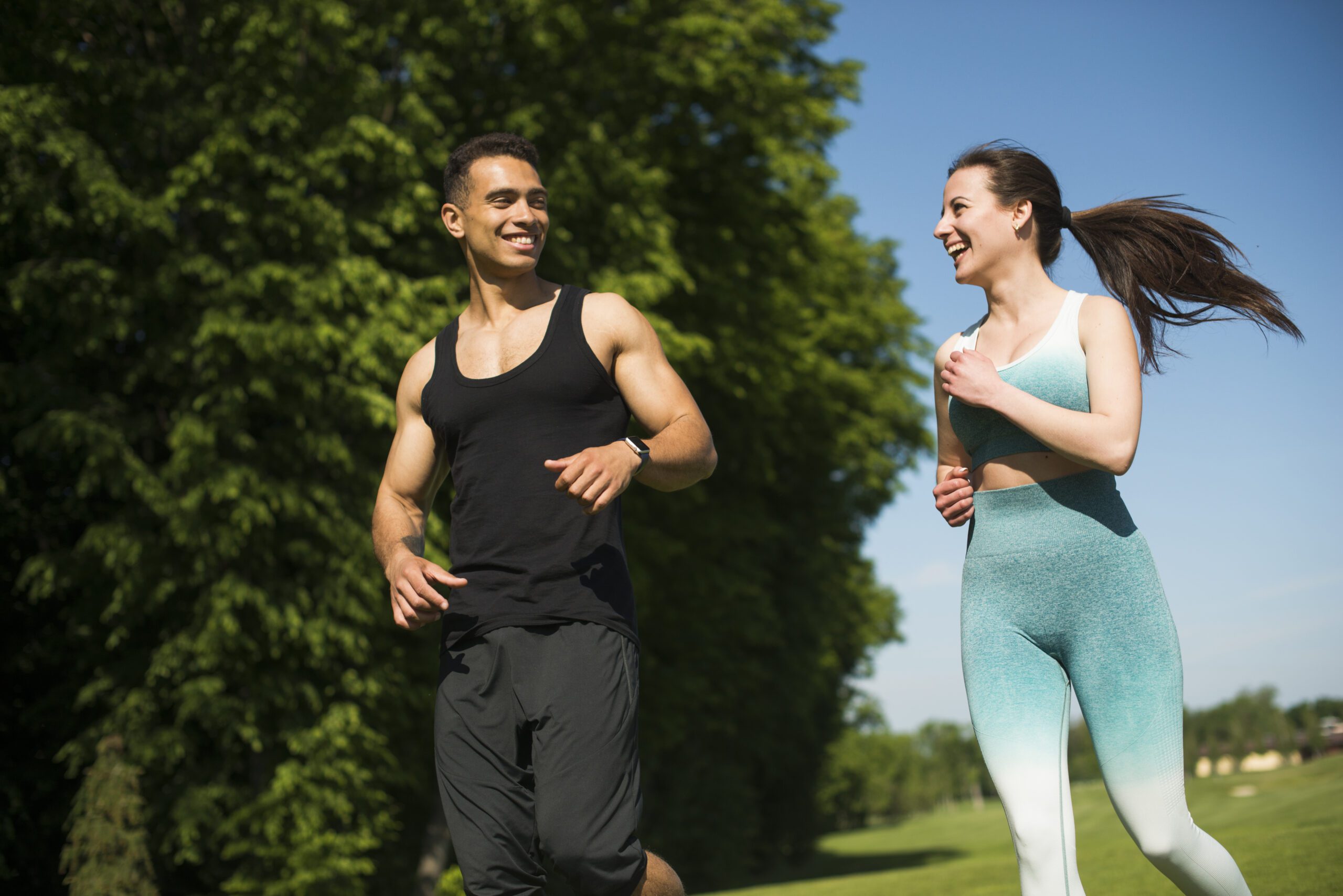 man woman running outdoor park scaled